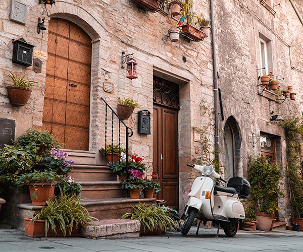 Vespa in charming village in Italy