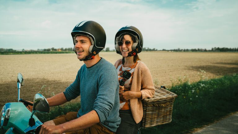 couple on a Vespa in Brugge