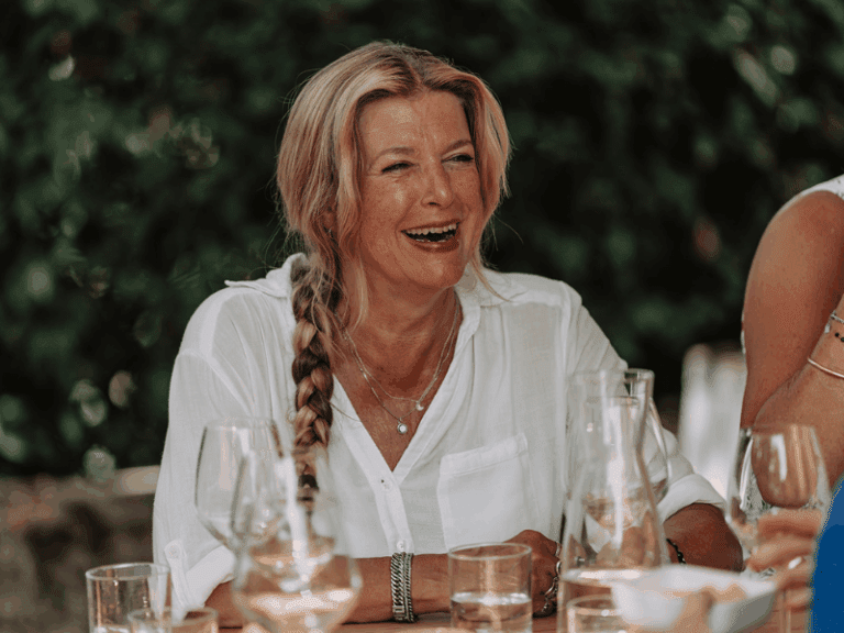 Woman laughing in Tuscany