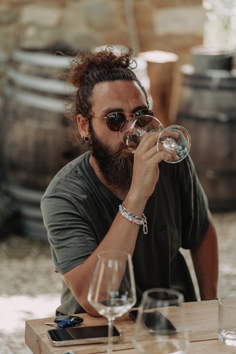 man enjoying wine in Chianti