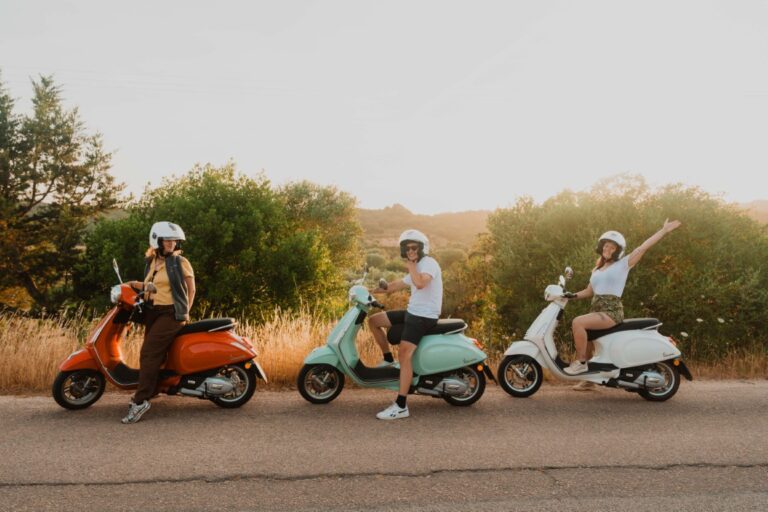 People enjoying their Vespa ride